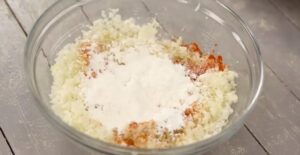 mixing masala with Manchurian