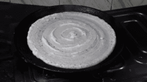 dosa making on pan