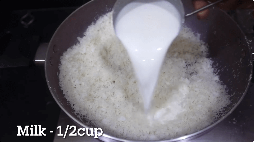 add milk in coconut powder