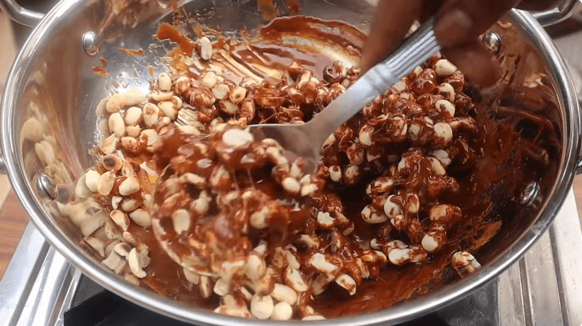 mix jaggery and peanuts