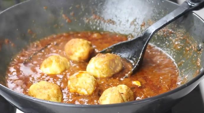 add in gravy fried and boiled egg